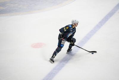 BUDAPEST - FEBRUARY 2: MAC Budapest (Budapest Jégkorong Akadémia Hockey Club) (blue) and Gyergyoi HK  (white) ice hockey teams participate in Championship, February 2, 2024 in Budapest, Hungary.-stock-photo