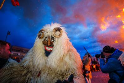 MOHACS, HUNGARY - FEBRUARY 12: Busojaras carnival. Unidentified person wearing mask for spring greetings. February 12, 2024 in Mohacs, Hungary.-stock-photo