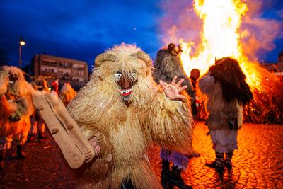 MOHACS, HUNGARY - FEBRUARY 12: Busojaras carnival. Unidentified person wearing mask for spring greetings. February 12, 2024 in Mohacs, Hungary.-stock-photo