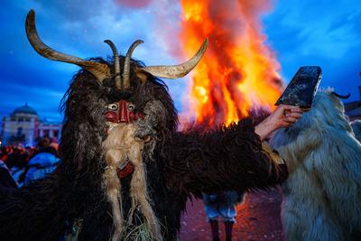 MOHACS, HUNGARY - FEBRUARY 12: Busojaras carnival. Unidentified person wearing mask for spring greetings. February 12, 2024 in Mohacs, Hungary.-stock-photo