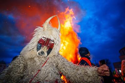 MOHACS, HUNGARY - FEBRUARY 12: Busojaras carnival. Unidentified person wearing mask for spring greetings. February 12, 2024 in Mohacs, Hungary.-stock-photo