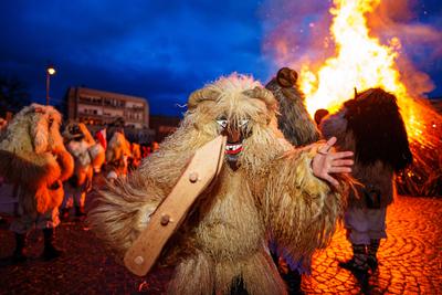 MOHACS, HUNGARY - FEBRUARY 12: Busojaras carnival. Unidentified person wearing mask for spring greetings. February 12, 2024 in Mohacs, Hungary.-stock-photo