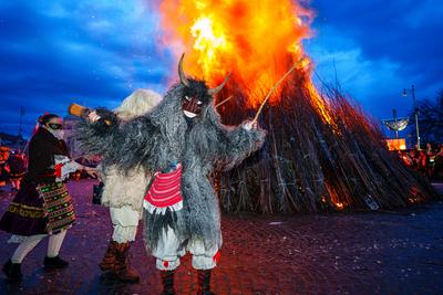 MOHACS, HUNGARY - FEBRUARY 12: Busojaras carnival. Unidentified person wearing mask for spring greetings. February 12, 2024 in Mohacs, Hungary.-stock-photo