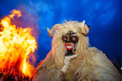 MOHACS, HUNGARY - FEBRUARY 12: Busojaras carnival. Unidentified person wearing mask for spring greetings. February 12, 2024 in Mohacs, Hungary.-stock-photo