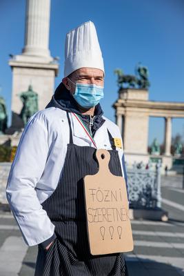 In Heroes' Square, the owners and employees of bars, restaurants and hotels are protesting against the restrictions related to the coronavirus affecting their businesses in Budapest,-stock-photo