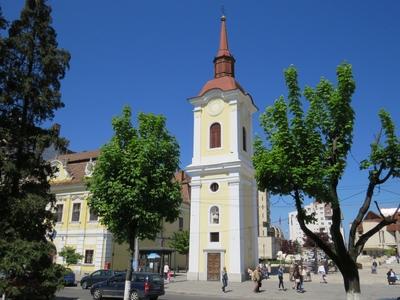 Târgu Mures (Marosvásárhely, 11 May 2017The Main Square and the Franciscans' Church.A Fõ tér és a Barátok Temploma. A XVIII. sz-ban épült Ferences kolostor megmaradt része.-stock-photo