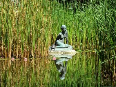 Siitting girl statue - Margaret Island - Budapest-stock-photo