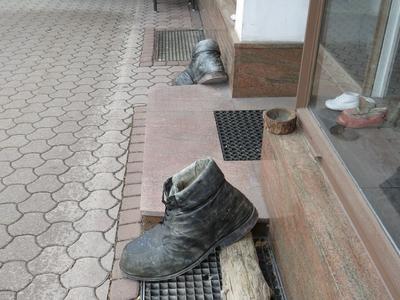 Giant shoes - Cpobbler shop - Austria-stock-photo