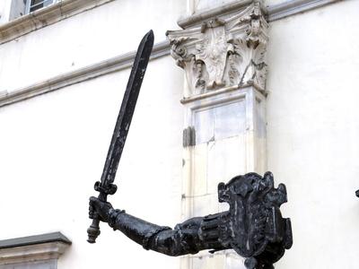 Hand grabbing sword - Spittal - Austria-stock-photo
