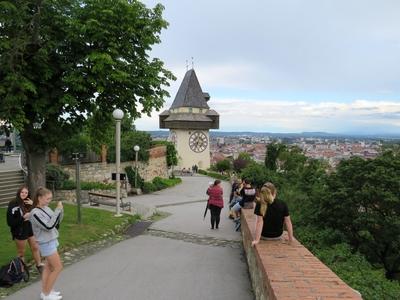 Tourists at Clock Tower - Graz - Austria-stock-foto