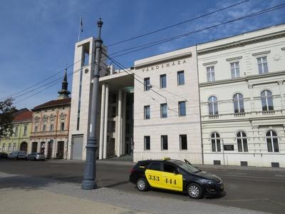 City Hll and taxi - Miskolc - Hungary-stock-photo