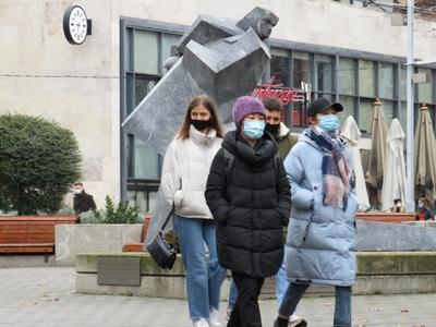People in Masks - Coronavirus - Budapest - Christmas-stock-photo