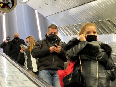 People min masks on the Subway escalator - Budapest-stock-photo