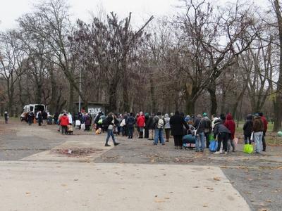 Homeless pőeople in line waiting for food distribution - Hungary-stock-photo