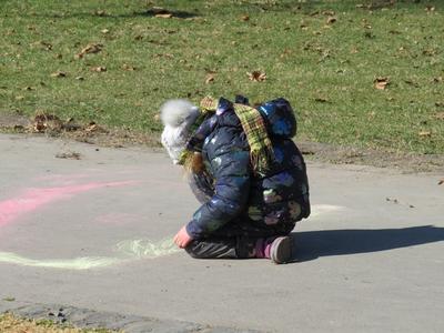 Cild draws with chalk - Spring in Budapest-stock-photo