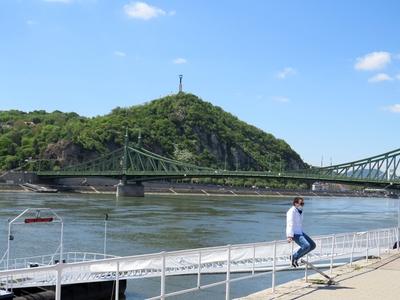 Man sunbathing at the Danube barrier - Budapest-stock-photo