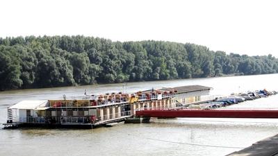 Szeged - Tisza river - Boat house and peer-stock-foto