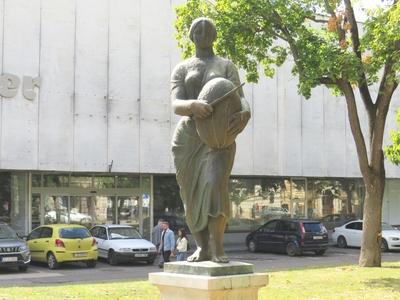 Statue of Woman breaking bread - Szeged - Hungary-stock-photo