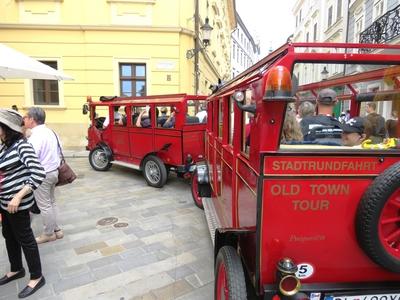 Bratislava, 19 May 2018Sightseeing tourist train on one of the streets of the old town.Városnézõ turistavonat az óváros egyik utcáján.-stock-photo