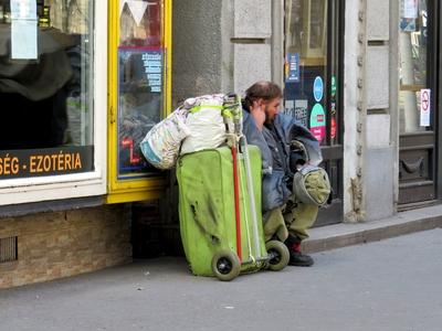 Homeless Man - Squirrels - Budapest - Big boulevard-stock-photo