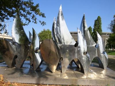 Chrome steel spatial sculpture entitled Flames - Sport symbol - Budapest-stock-photo