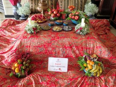 Traditional bowls (Korsi) composed of fruit and flowers in the lobby of an Iranian hotel - Tehran-stock-photo