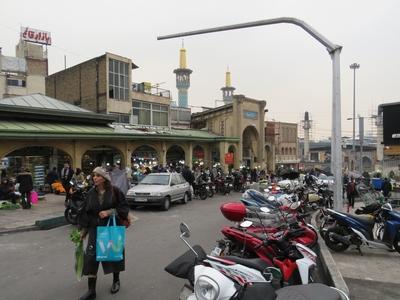 Iranian woman leaving the Grand Bazaar after shopping - Tehran-stock-photo