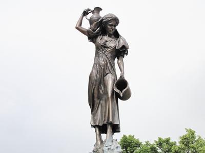 Fountain statue Girl with a Bowl - Pápa - Hungary-stock-photo