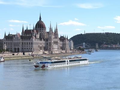 Budapest - Tourist boat on the Danube in front of the Parliament-stock-photo