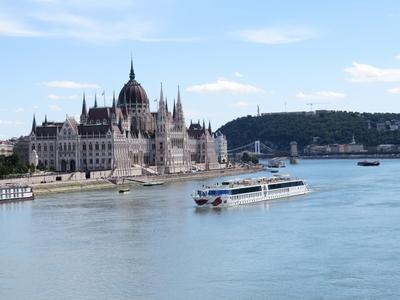 Budapest - Tourist boat on the Danube in front of the Parliament-stock-photo