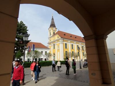 People walking in Székesfehérvár City Hall square - Hungary-stock-photo