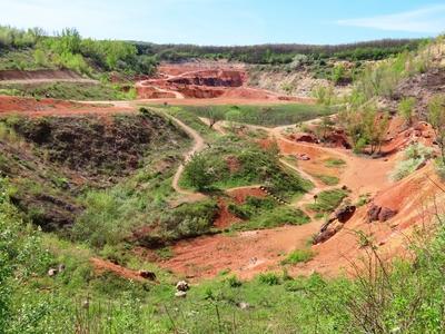 Gánt - Hungary - Bauxit mining site - Red earth-stock-photo