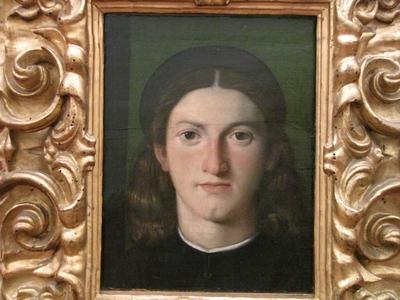Portrait of a young man - Lorenzo Lotto - Uffizi Gallery - Florence-stock-foto