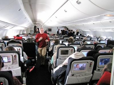 Paris, 24 January 2015The cabin with passengers of a Boeing 777 aitcraft of Air France.Az Air France l?git?rsas?g Boeing-777 t?pus? rep?l?g?pe utaster?nek r?szlete utaz?kkal.-stock-foto