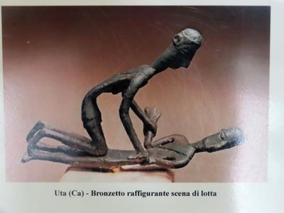 Nuragh sculpture depicting wrestlers in the Zapata museum in Barumini - Sardnia - Italy-stock-foto