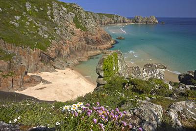 Pednvounder Beach and Treen Cliffs at Porthcurno, Cornwall, England, U.K.-stock-photo