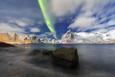 Northern Lights (aurora borealis) illuminate Hamnoy village and snowy peaks, Lofoten Islands, Arctic, Norway, Scandinavia, Europe-stock-photo