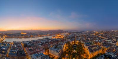 Aerial panoramic photo about Budapest old town part in sunset time. Included the Chain bridge, Danube river, fishermans bastion and Matthias chrch, Szchenyi square, hungarian Parliament building, Margaret bridge and many more ladnmark.-stock-photo