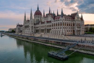 Aerial view of the beautiful Hungarian Parliament building by River Danube on a bright summer day with blue sky and clouds-stock-photo