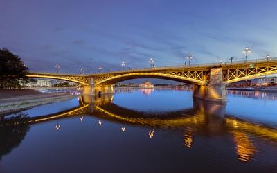 Amazing panoramic phot about the Margaret bridge in Budapest Hungary. Evening mood, popular touris attraction a river cruise in this time. panoramic view-stock-photo