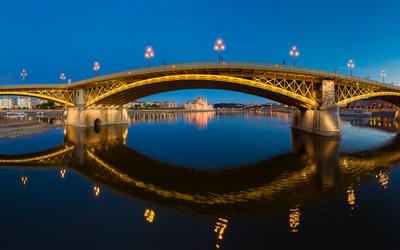 Amazing panoramic phot about the Margaret bridge in Budapest Hungary. Evening mood, popular touris attraction a river cruise in this time. panoramic view-stock-photo