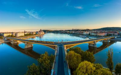 Amazing panoramic phot about the Margaret bridge in Budapest Hungary. Evening mood, popular touris attraction a river cruise in this time. panoramic view-stock-photo