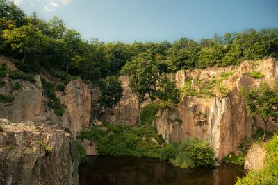 Flooded ancient stone quarry in Hungary near Sarospatak-stock-photo