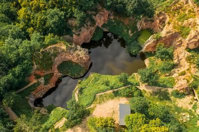 Flooded ancient stone quarry in Hungary near Sarospatak-stock-photo