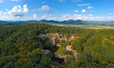 Flooded ancient stone quarry in Hungary near Sarospatak-stock-photo