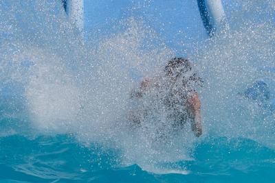 Waterslide splashing-stock-photo