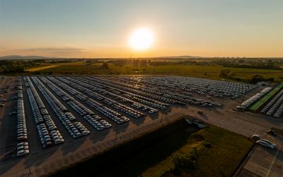 Aerial view new cars lined up in the parking station-stock-photo