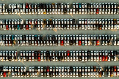 Aerial view new cars lined up in the parking station-stock-photo