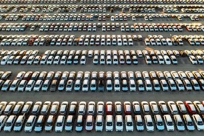 Aerial view new cars lined up in the parking station-stock-photo