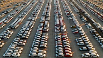 Aerial view new cars lined up in the parking station-stock-photo